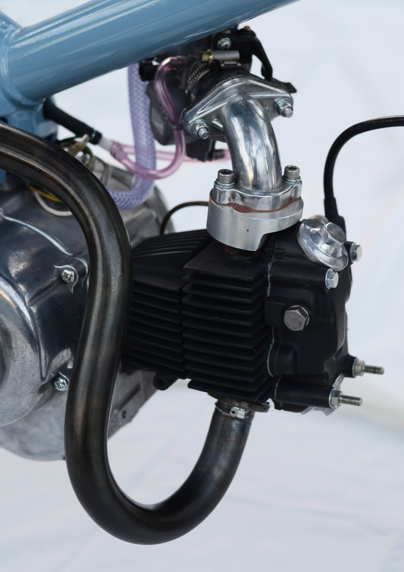 Illustration for article titled This Is What Happens When You Turn A Honda Super Cub Into A Badass Racer